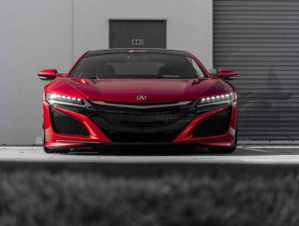 Red Honda NSX shown from the front