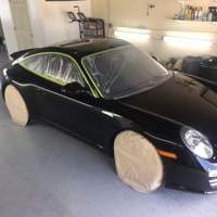 Black Porsche. Opens new window.