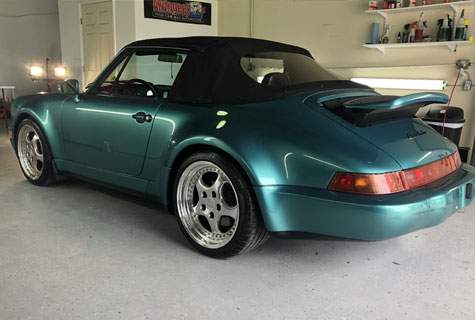 Green Porsche rear view